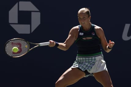 Sep 2, 2022; Flushing, NY, USA; Shelby Rogers (USA) hits a forehand against Ons Jabeur (TUN) (not pictured) on day five of the 2022 U.S. Open tennis tournament at USTA Billie Jean King Tennis Center. Mandatory Credit: Geoff Burke-USA TODAY Sports