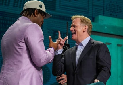 Apr 27, 2023; Kansas City, MO, USA; Georgia defensive lineman Jalen Carter reacts with NFL commissioner Roger Goodell after being selected by the Philadelphia Eagles ninth overall in the first round of the 2023 NFL Draft at Union Station. Mandatory Credit: Kirby Lee-USA TODAY Sports