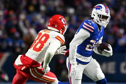 Jan 21, 2024; Orchard Park, New York, USA; Buffalo Bills running back Latavius Murray (28) rushes the ball against Kansas City Chiefs cornerback L'Jarius Sneed (38)in the first half of the 2024 AFC divisional round game at Highmark Stadium. Mandatory Credit: Mark Konezny-USA TODAY Sports